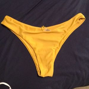 Yellow cheeky bikini bottoms